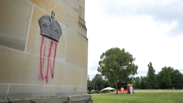 The King George Memorial in front of Old Parliament House has been vandalised with red spray paint.
