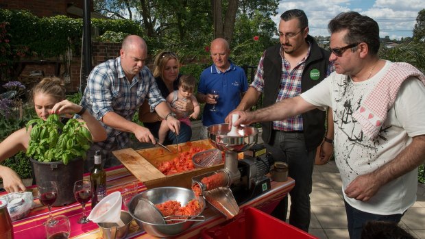 Chef Guy Grossi (right) got his hands dirty with family and friends in 2015.