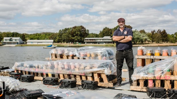 Pyrotechnic Fortunato Foti, of Foti International Fireworks, setting up fireworks for this year's Skyfire.