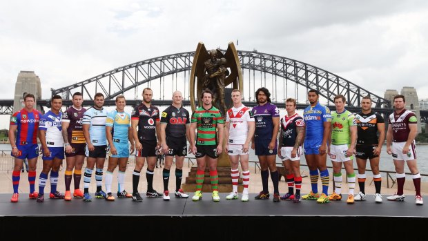 Ready to entertain you: Players from 15 clubs at the launch of the NRL's 2015 season advertising campaign.