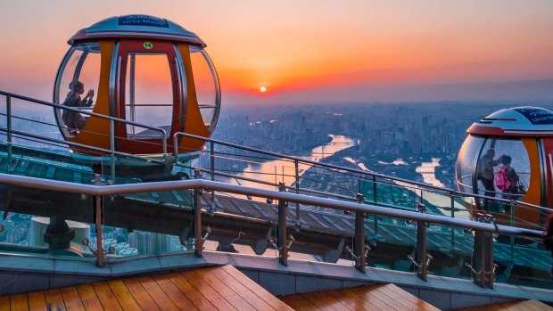 Riding high on the tram at Canton Tower.