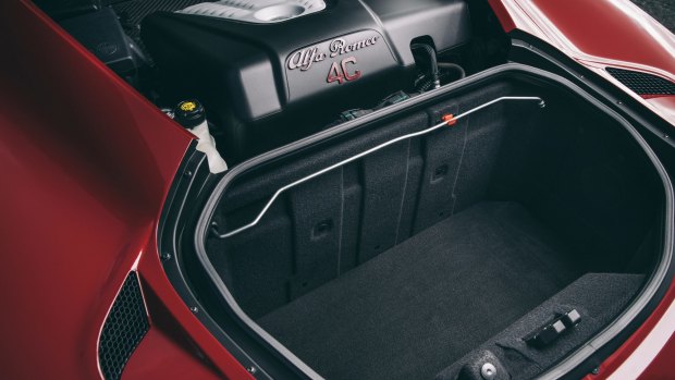 The compact boot space behind the mid-mounted engine promises no more than a weekend away.