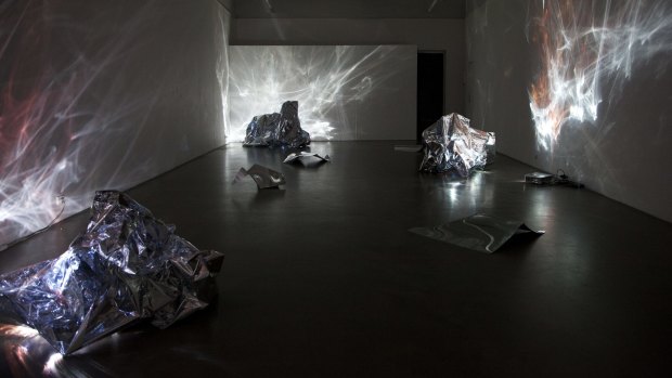 "Embedded In You" features patterns projected onto multifaceted surfaces which then cast reflections on the walls. 