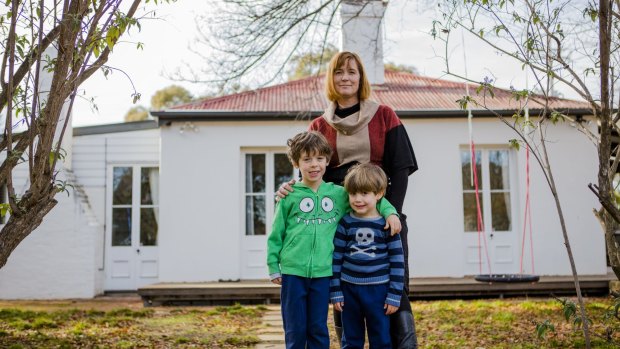 Kate Gauthier is concerned about heritage being destroyed at Oaks Estate. She stands with her two sons Atticus 5, and Luther 4.
The Canberra Times
