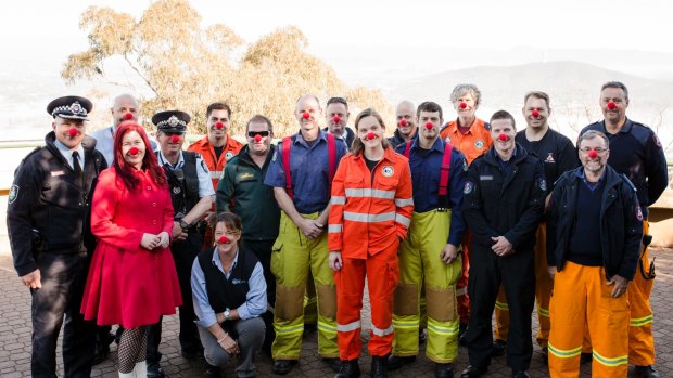 At the top of Mount Ainslie on Wednesday, Canberra's emergency and transport services got into the spirit of Red Nose Day, which is Friday, June 30. 