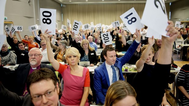 Norwegian Church Council leader Kristin Gunleiksrud Raaum (80) and chairman of the Oslo diocesan council Gard Sandaker-Nielsen (81) vote with others to marry same-sex couples.