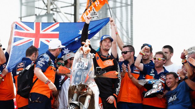 Proud Australian: Toby Price of the KTM Rally Factory Team celebrates his third place in the Dakar Rally with his team in Buenos Aires.