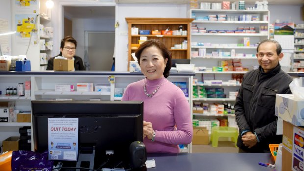 Liem, Kim, and Tan Dang are trying to stay positive about the future of the Narrabundah Pharmacy despite growing pressure from competitors.