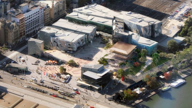 The proposed Apple store (gold roof) is a departure from the rest of Fed Square's look.