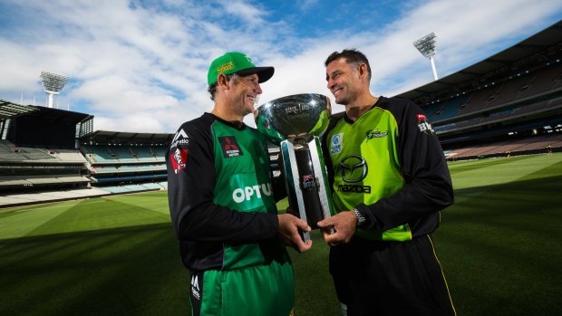 Brotherly love: David and Michael Hussey with the BBL trophy ahead of Sunday's final between the Stars and Thunder.