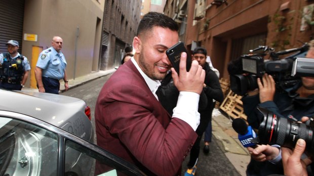 Salim Mehajer leaves Darling Harbour police station after allegedly assaulting a taxi driver.