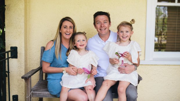 Canberra United coach Heather Garriock has announced her pregnancy on the eve of the W-League season. Pictured with husband Matt, and daughters, Noa, 3, and Kaizen, 5.