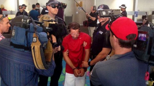 One of Aniello Vinciguerra's co-accused being extradited from the Northern Territory. 