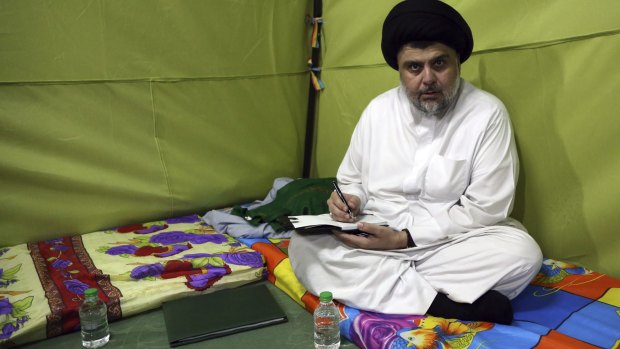 Shiite cleric Muqtada al-Sadr sitting inside his protest tent in Baghdad's fortified Green Zone. 