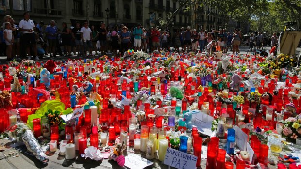 A sea of candles and flowers at the site of last week's terror attack.