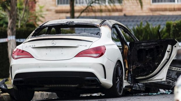 A white Mercedes used in the shooting of Wally Ahmad was found burnt out in Greenacre minutes after the murder. 