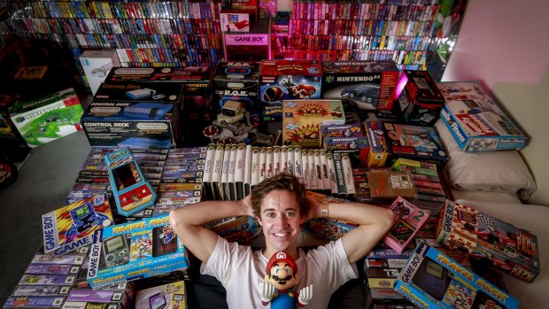 Sam Crowther shows off some of his huge Nintendo collection. 