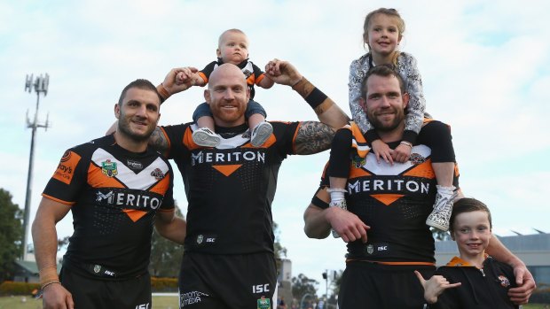 Veterans farewell: Robbie Farah, Keith Galloway and Pat Richards pose after the match.