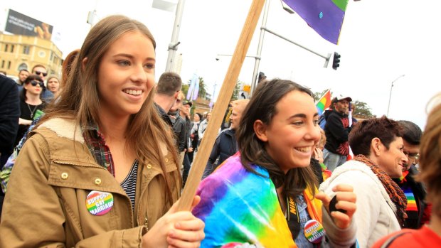 Jessica Feyder (left) and Samantha Ritchie lobby for marriage equality at a rally in Taylor Square, Darlinghurst, on Sunday.