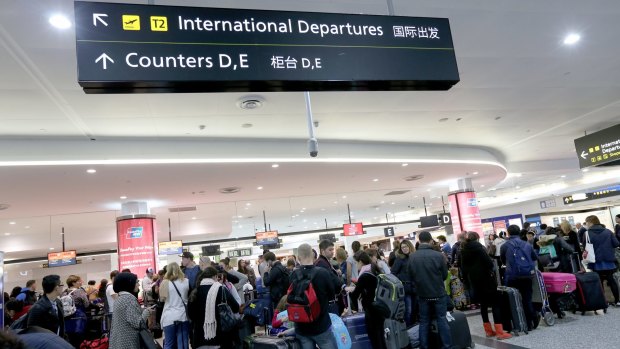 Travellers faced long queues during a two-hour strike at Melbourne Airport in July.