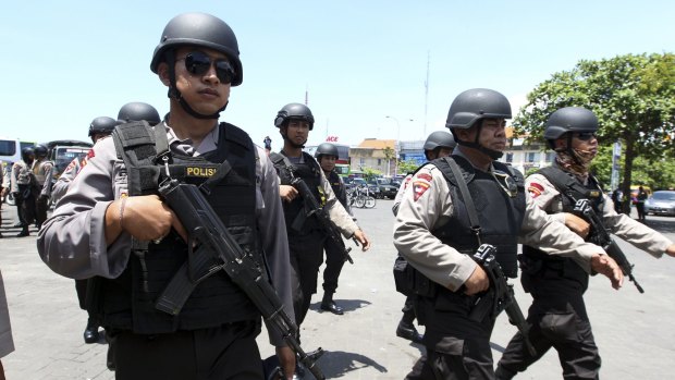 Balinese police on patrol last month. 