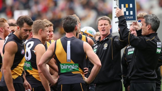 Damien Hardwick urges his players on during a break in Sunday's match.