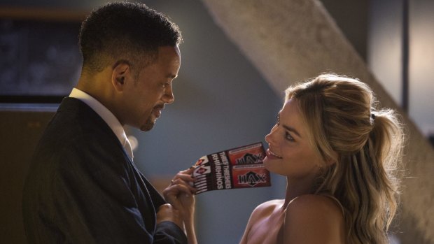 Chemistry: Margot Robbiewith Will Smith in <i>Focus</i>.