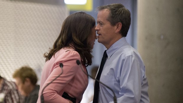 Federal opposition leader Bill Shorten is welcomed on stage by Annastacia Palaszczuk.