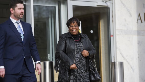 Zimbabwean ambassador Jacqueline Zwambila, and her lawyer Jon May leave court.
