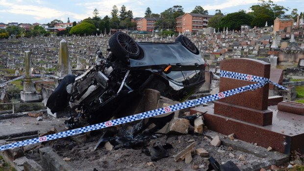 A car ploughed through a wall into Randwick Cemetary on early on Tuesday morning.