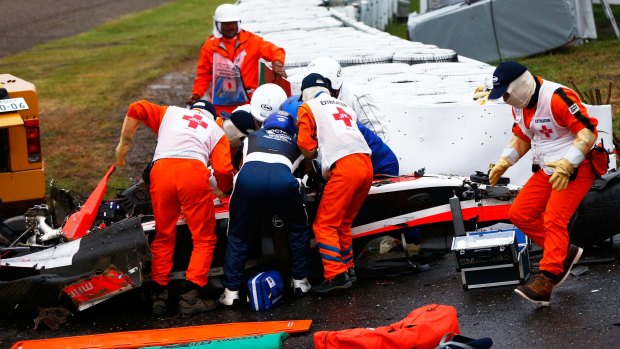 Jules Bianchi receives urgent medical treatment after crashing during the Japanese Formula One Grand Prix.