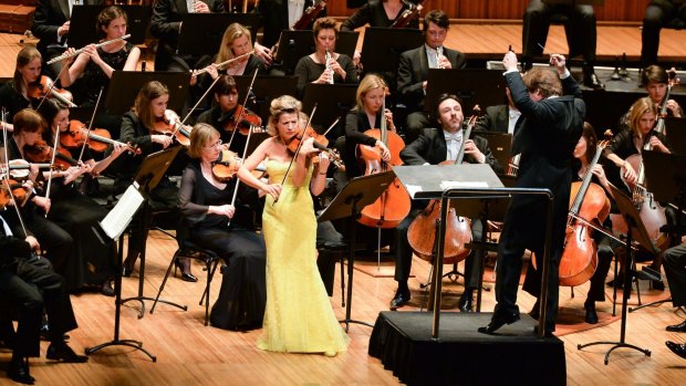 Anne-Sophie Mutter shares the spotlight with the Sydney Symphony Orchestra at the Sydney Opera House.