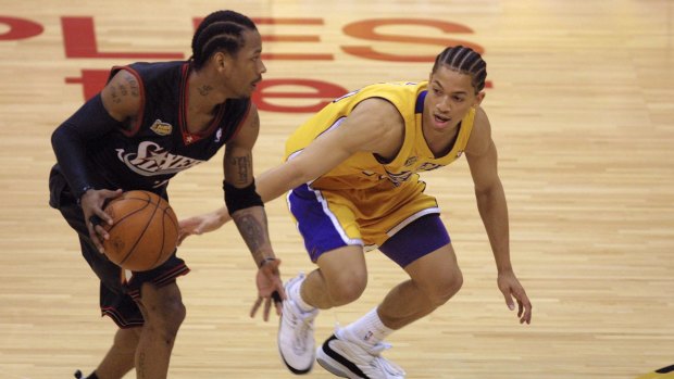 Championship winner: Tyronn Lue guards Philadelphia star Allen Iverson during the LA Lakers' win in the 2001 NBA Finals.