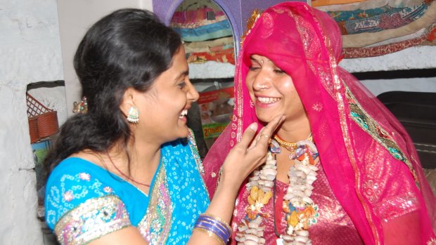Lakshmi Sargara, 19, (right) on her second wedding day - to a man of her choice - with Kriti Bharti.