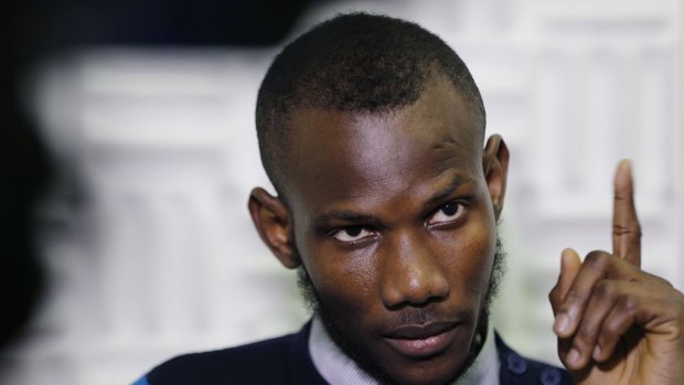 Naturalised ... Malian Lassana Bathily, a Muslim employee who helped Jewish shoppers hide in a cold storage room from an Islamist gunman, has been made a French citizen.