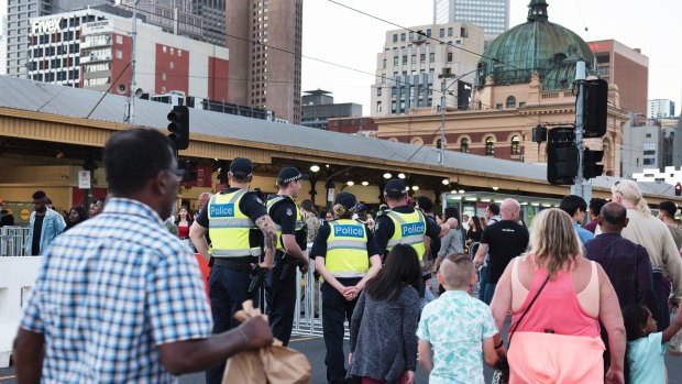 More than 1000 people were searched by police during New Year's Eve celebrations in Melbourne.