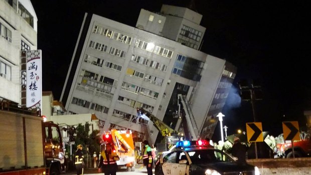 Rescue workers are searching for any survivors trapped inside a building that collapsed onto its side from a 6.4 magnitude earthquake in Hualien County.