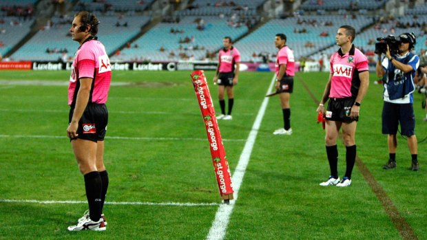 Sideline eyes: Extra match officials watch the action during the Charity Shield between South Sydney and the Dragons at ANZ Stadium.