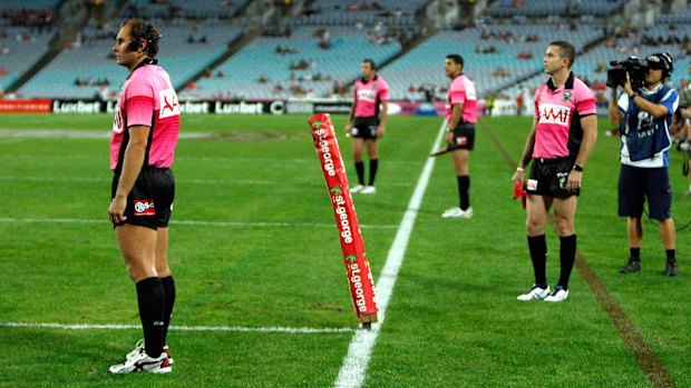 Sideline eyes: Extra match officials watch the action during the Charity Shield between South Sydney and the Dragons at ANZ Stadium.