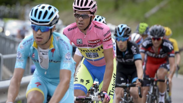 Tinkoff-Saxo rider Alberto Contador of Spain (right) climbs during the 165-kilometre 15th stage of the Giro d'Italia  from Marostica to Madonna di Campiglio on Sunday. 