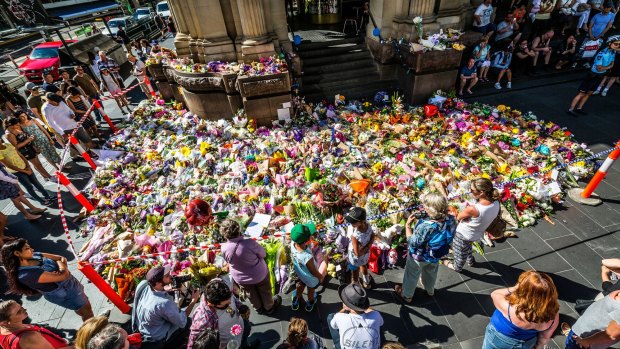 The floral tribute to victims of Bourke St have been mulched and spread across three victims of crime memorial sites in Melbourne.