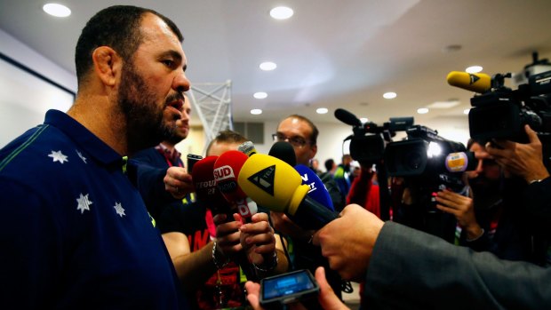 Face the press: Michael Cheika speaks to the media at The Lensbury Hotel.