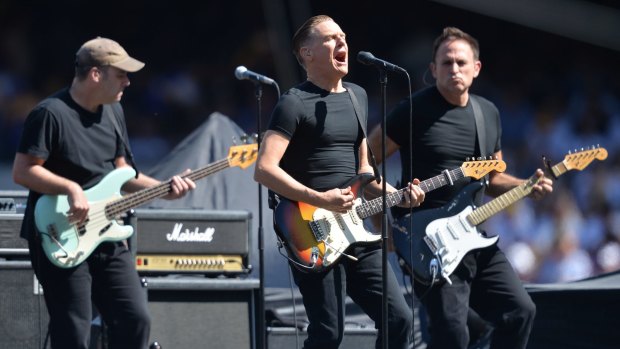 Bryan Adams performs at the AFL grand final at the MCG.