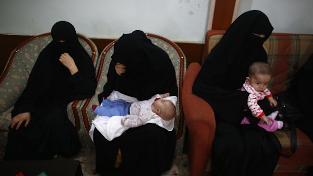 Uighur women and children in Istanbul in July, after fleeing from China where they say they were persecuted. 