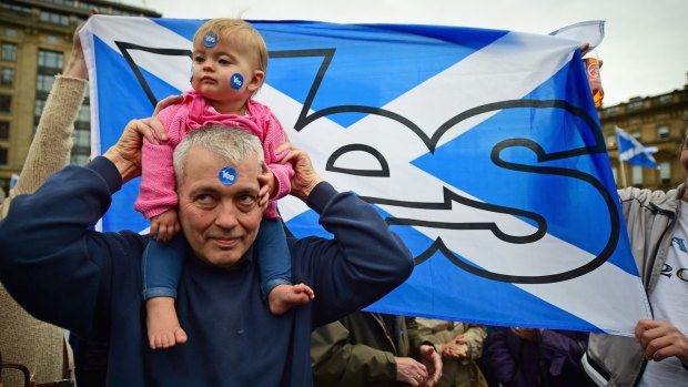 Voting yes: Scots show their support for the independence referendum in Glasgow.