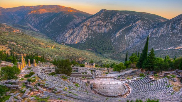 Sunset view of ruins of theatre at ancient Delphi, Greece.