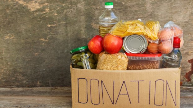 Shopping for a food drive will help the needy, but donating cash to the food bank will probably be more effective.