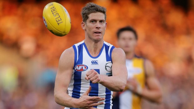 North Melbourne held an 11-point lead just on half-time when Nick Dal Santo made the slightest contact with Luke Shuey and conceded another soft free kick.