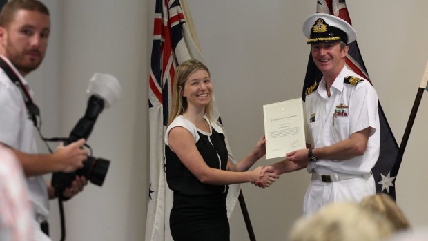 New recruit Gabrielle Saunders with Commander Todd Wilson at Monday's enlistment ceremony in Parramatta.