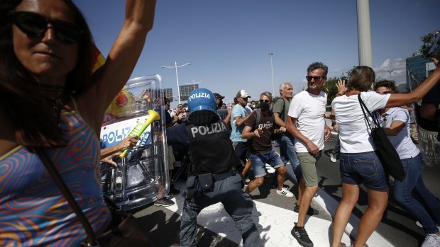 Police clash with Alitalia workers after they blocked the highway leading to the Rome Leonardo Da Vinci international airport during a protest last month. 